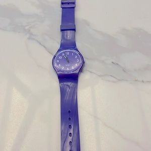 Plastic Purple Swatch watch (worn) - water resistant